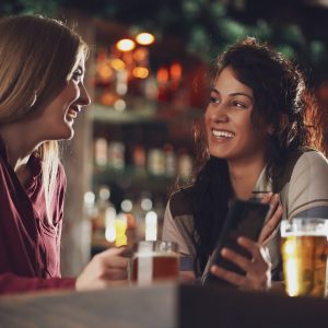 Girlfriends in bar